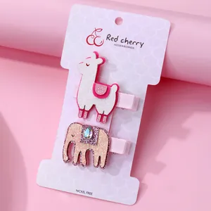 Cute alpaca and elephant glitter hair clips for girls on a display card for kids