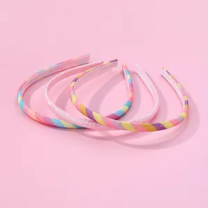 Lot de quatre serre-têtes pailletés pour filles avec rayures arc-en-ciel et fini rose doux