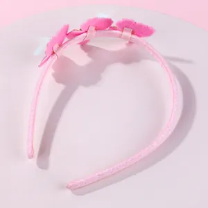 Pink sequin butterfly headband for girls with three 3D butterflies on a display stand