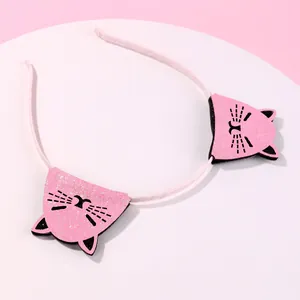 Cute pink sequin cat ear headband with glitter details and non-slip woven fabric cover