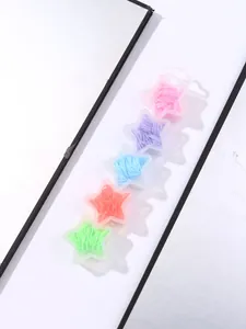 Close-up of five-piece colorful elastic hair ties set in star-shaped transparent boxes