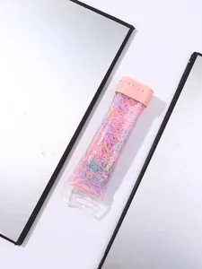 Bulk colorful elastic hair bands for kids in a transparent tube with a pink flip top lid