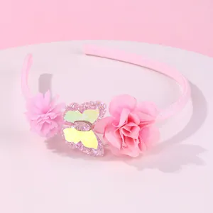 Cerchietto rosa con fiori fatti a mano e farfalla glitterata accessorio per capelli