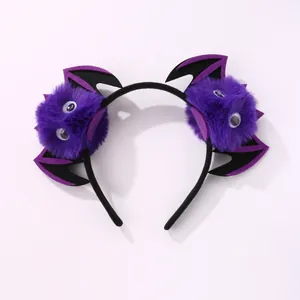 Cartoon purple owl headband with plush pom poms and bat wings for Halloween parties