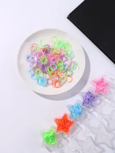 Colorful elastic hair bands set in star-shaped organizer box on white background