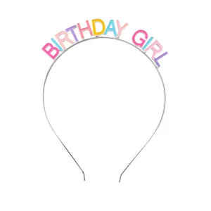 Detail of silver metal headband with colorful Birthday Girl lettering for party gifts