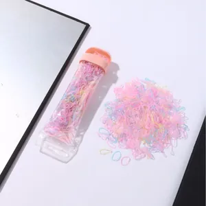 Colorful high-elasticity kids hair ties in transparent storage tube with pink cap