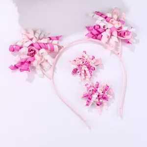 Pink and white cat ear headband set with matching pom-pom hair clips for little girls