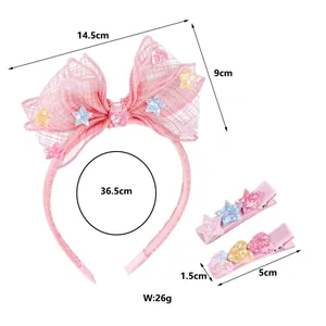 Detailed size chart of pink bow headband and hair clips with glitter star and heart motifs