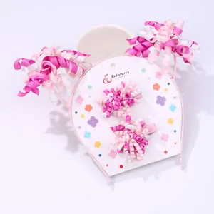 Pink and white flower ribbon headband and clip set for kids on floral card