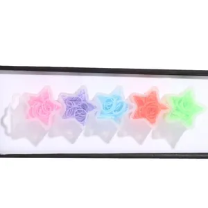 Colorful kids elastic hair bands in five star-shaped clear boxes for storage