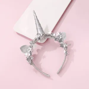 Sparkly silver unicorn headband for kids featuring glitter ears and star sequin accents
