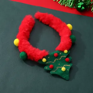 Plush Christmas tree headband with red faux fur and festive pom poms for pet celebration