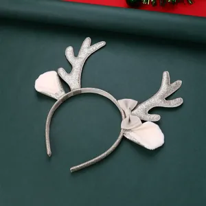 Diadema navideña de astas de reno con purpurina dorada, orejas de peluche y un lazo