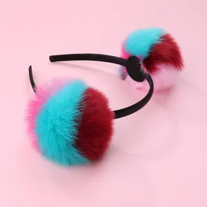 Cute kids headband with colorful gradient faux fur pom-poms on a slim black band