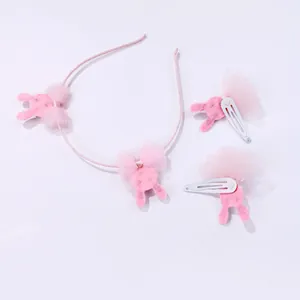 Pink kids hair accessory set with rabbit felt ears and soft mesh bows on a headband