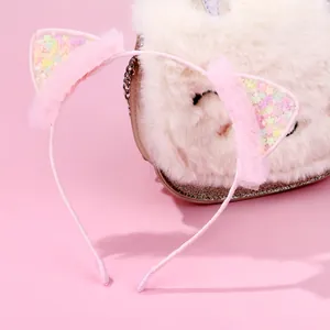 Cerchietto orecchie da gatto rosa per bambina con pizzo e glitter a stella
