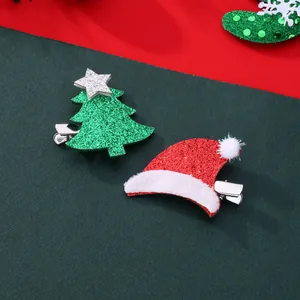 Christmas hair clips set featuring glittery Christmas tree and Santa hat for festive parties