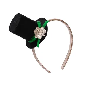 St. Patrick's Day headband with black top hat, green bow, and gold clover on white background