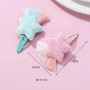Star-shaped hair clips with glitter and tassels, measuring 8cm length and 4.5cm width