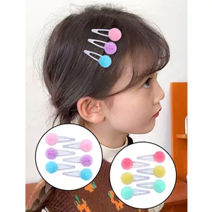 Lot de barrettes enfant avec pompons colorés et pinces BB en métal pailleté