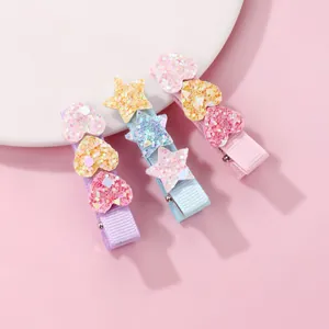 Three-piece kids glitter hair clips set with heart and star shapes in purple, blue, and pink