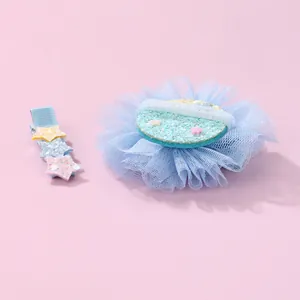 Mollette per capelli blu con stelle di paillettes e fiori in rete per bambine