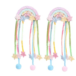 Rainbow hair clips for girls with glitter stars, sequins and soft tassel pom poms