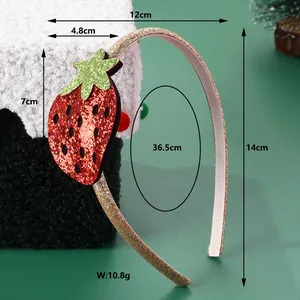 Sparkly red strawberry headband on a thin gold metal frame with non-slip inner grip