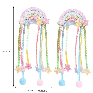 Rainbow hair clip with star sequins and colorful tassel streamers for girls