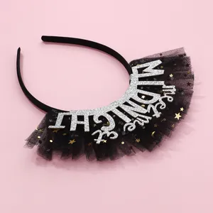 Close-up of Midnight sequins mesh headband featuring silver glitter lettering and stars