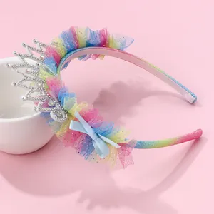 Detail of princess tiara headband with rainbow mesh and sparkling diamond crown