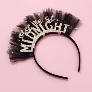 Detail of black midnight party headband with golden star sequins and mesh veil decoration