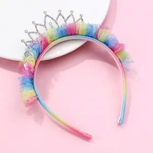 Detailed shot of kids tiara headband with rainbow lace pleats and silver rhinestones
