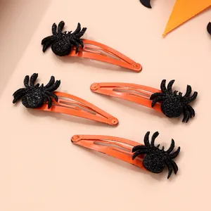 Lot de quatre barrettes araignée à paillettes pour Halloween en orange et noir festif