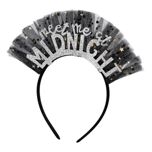 Detail of midnight party headband with black mesh and silver meet me at midnight text