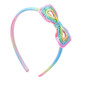 Rainbow sequin bow headband for girls with glitter finish and non-slip inner grip