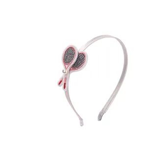 Kids sports style fabric headband with embroidered tennis rackets and pearl detail