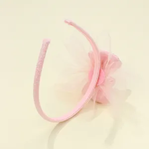 Cerchietto rosa per bambini con grande fiocco in rete e glitter per feste da principessa