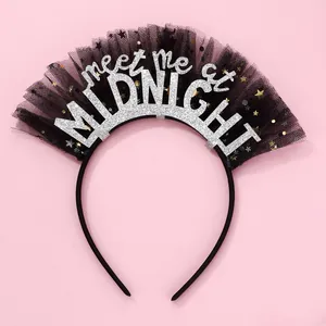 Close-up of black mesh headband with silver glitter Meet Me at Midnight letters