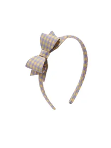 Detail of yellow and lilac gingham fabric headband featuring a double-layered 3D bow
