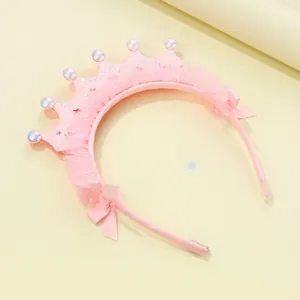 Pink crown headband with lace details and glitter finish for elegant young girls