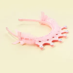 Pink crown headband for kids with lace bow and shimmering pearls in sweet style