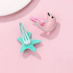 Fermagli per capelli a forma di delfino glitterato e stella in feltro tema marino
