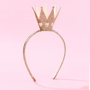 Detailed view of a rose gold glitter crown headband with a heart hollow-out design