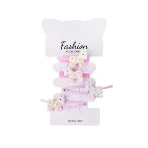 Unicorn kids hair accessories set with pink fabric ties and glitter hair clips