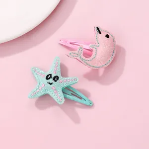 Set di fermagli per capelli glitterati con delfino e stella marina per bambine