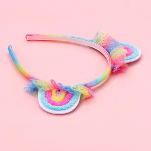 Serre-tête oreilles de chat arc-en-ciel avec dentelle en tulle sur fond rose