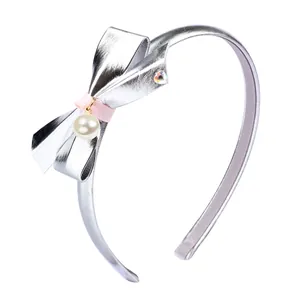 Shiny silver PU leather headband with bow, pink ribbon and pearl, featuring non-slip teeth
