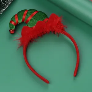 Detail of Christmas elf hat headband with red green stripes and feather trim decoration